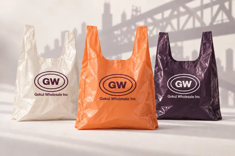 Custom plastic bag concepts in cream, apricot, and plum with the Gokul Wholesale GW oval logo